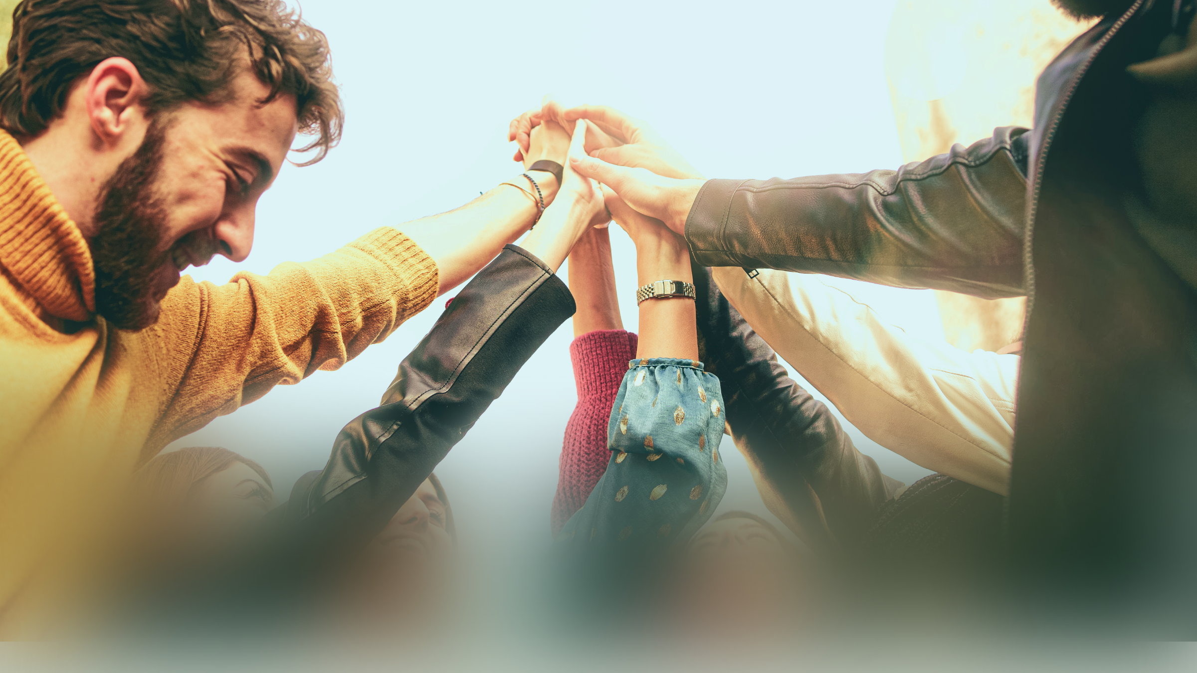 Hands stacked together