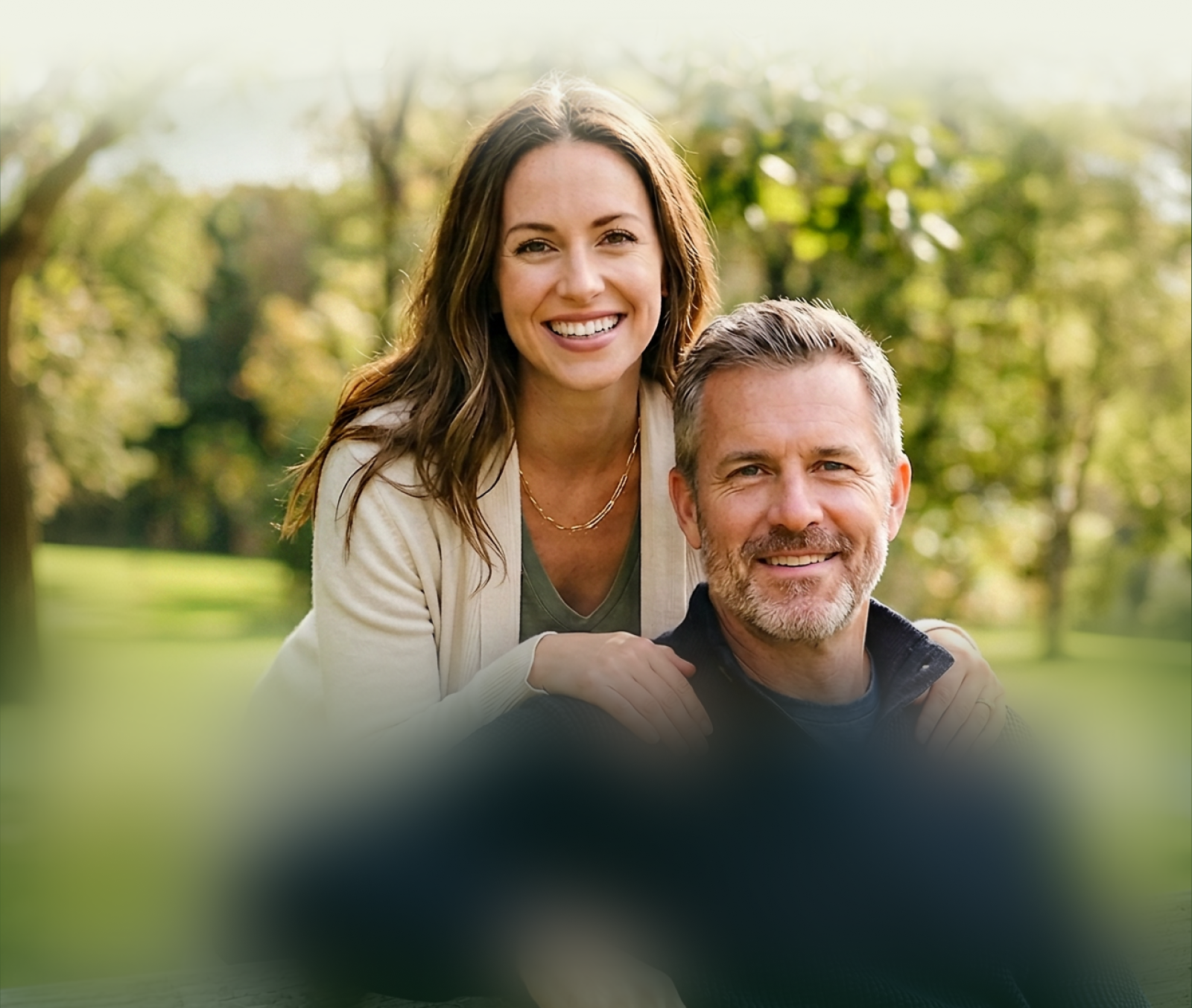 Couple smiling outdoors